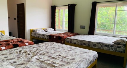 Naisarga hill view homestay Room Type - Triple Room