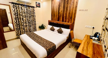 Thayamkery's Royal inn Room Type - Deluxe Triple Bed Room