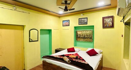 Suraj Inn Room Type - Deluxe Triple room AC
