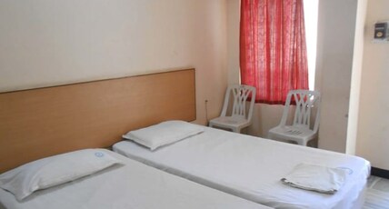 VEDHA LODGE PRIVATE LIMITED Room Type - Non ac double bedroom