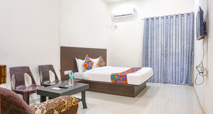 FabHotel Om Sai I Room Type - Family Room