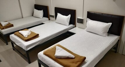 Hotel My Home Residency Room Type - Deluxe Four Bed AC Family Room