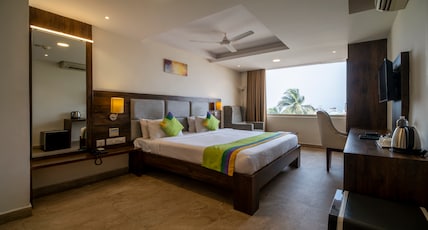 Treebo Premium PL Grand, Visakhapatnam Room Type - Deluxe Family Room Treebo Premium PL Grand, Visakhapatnam Room Type - Deluxe Family Room