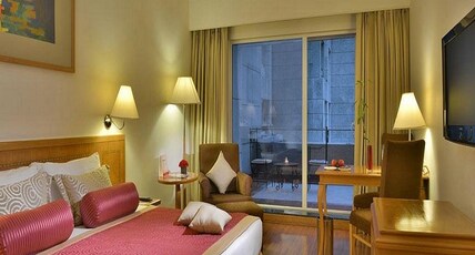 Vivanta Vadodara  Room Type - Deluxe Room City View Queen Bed