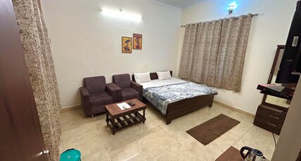 Krishnam Guest House Room Type - Deluxe Room