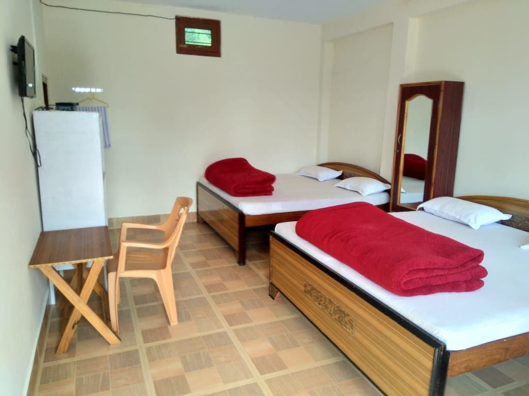 Maa Anandamayee Guest House - Tap to explore photos