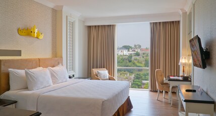 Swiss-Belhotel Lampung Room Type - Deluxe King Bed with Garden View