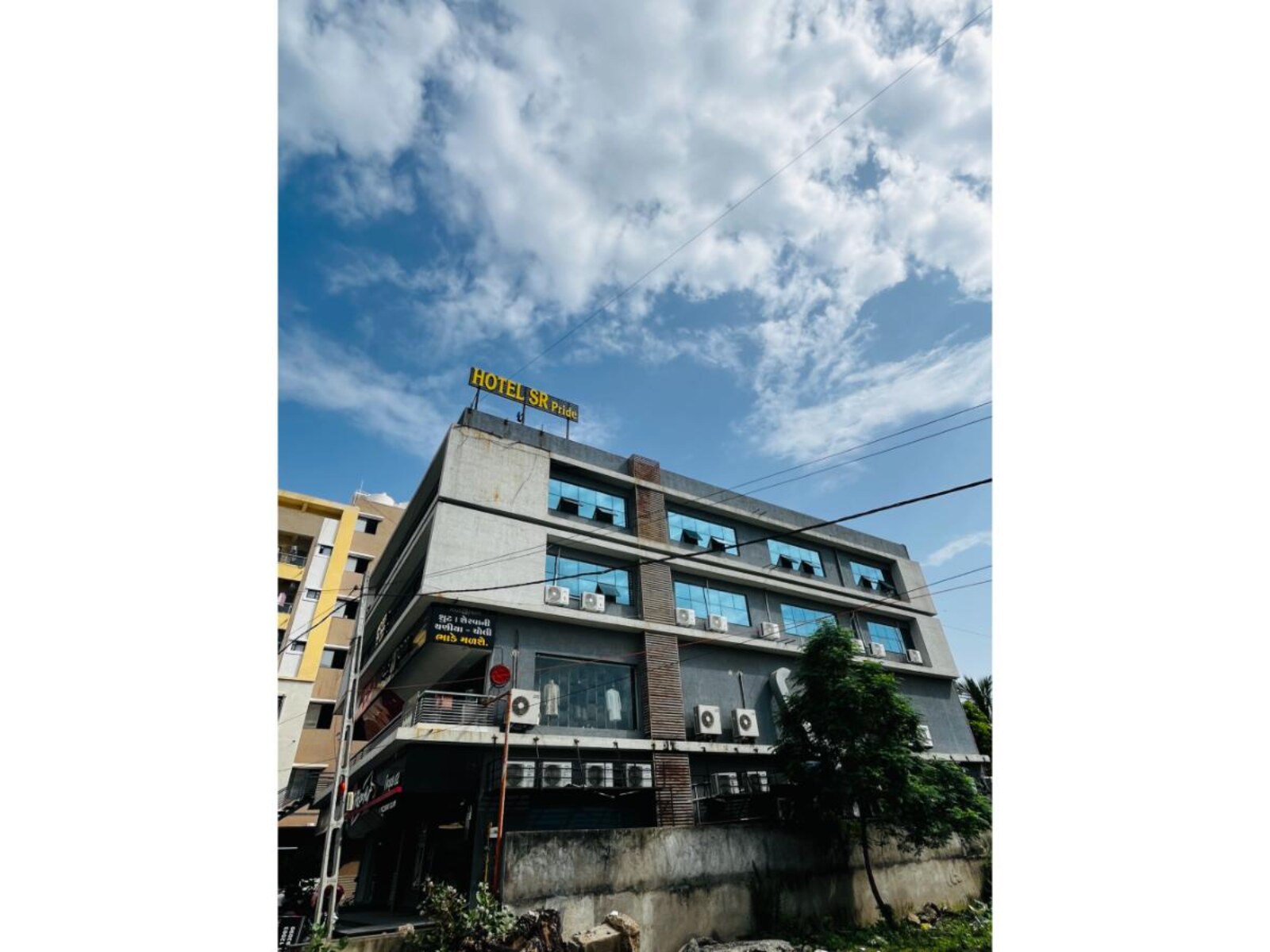Hotel SR Pride - Tap to explore photos