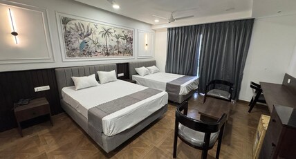 HOTEL SNR AURORA Room Type - THREE BEDDED ROOM AC WITH BALCONY