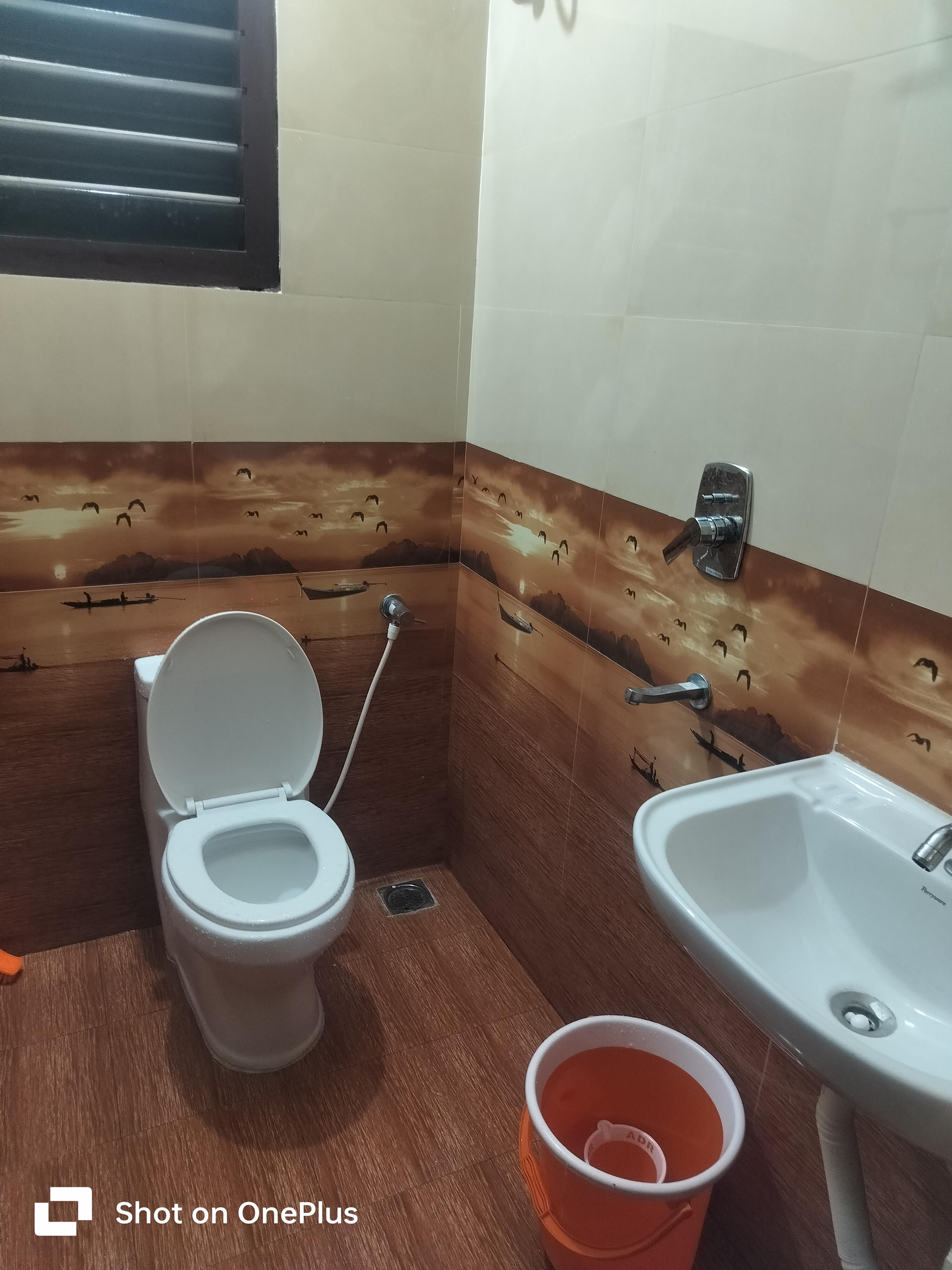 Sringam Service Apartments | Rooms & Kitchen - Tap to explore photos