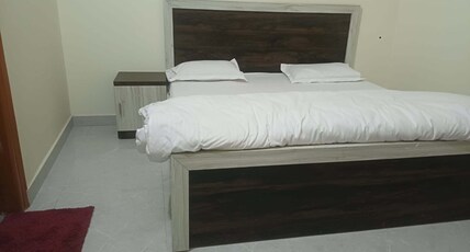 Sparsh Inn Hotel & Guest House Room Type - Deluxe Room