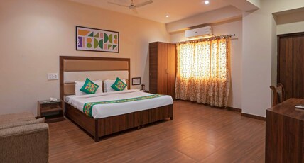 Treebo Golden Leaf DDN Room Type - Spacious Premium Room