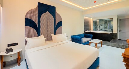 Hotel Nova Bloom Room Type - Luxury Suite with in Room jacuzzi Bath Tub and 55 Inch Android Smart T.V.
