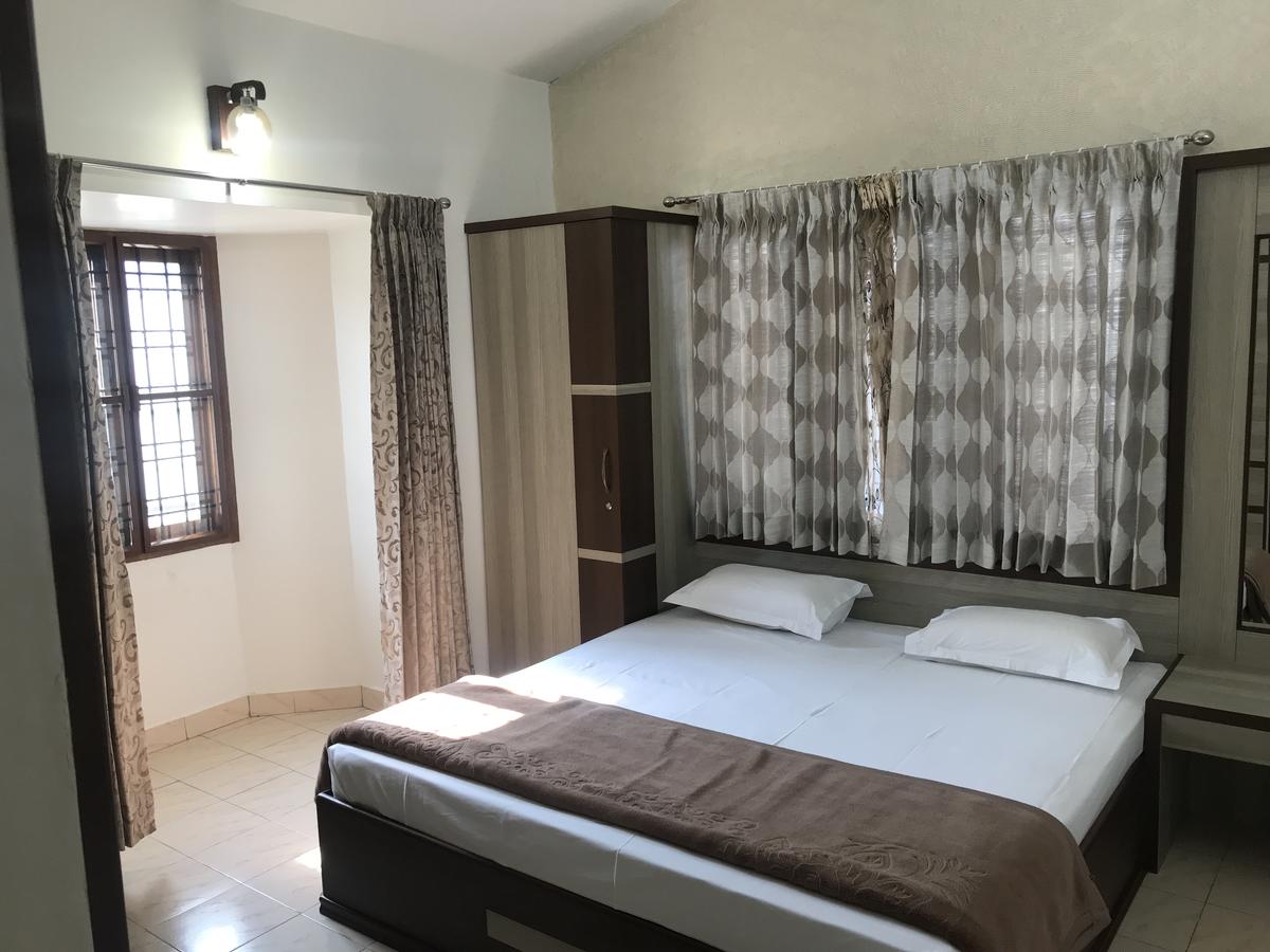 Serenity Manor Homestay | Rooms & Caretaker - Tap to explore photos