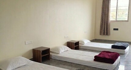 Ayanam Palace Room Type - 2 Beded Non-AC Floor Mattress Bedroom with Shared Bathroom