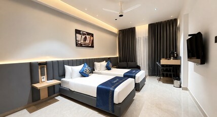 Kyzen Hotel Shamshabad Room Type - Premium Suite with twin bed Kyzen Hotel Shamshabad Room Type - Premium Suite with twin bed