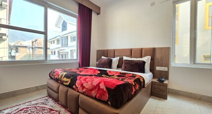 Hotel White Tulip (Nearby Shri Shankaracharya Temple) Room Type - Deluxe Room (Heating Electric Blanket)