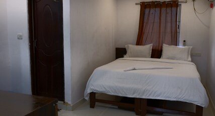 Cardamom Guest House Room Type - Deluxe Room