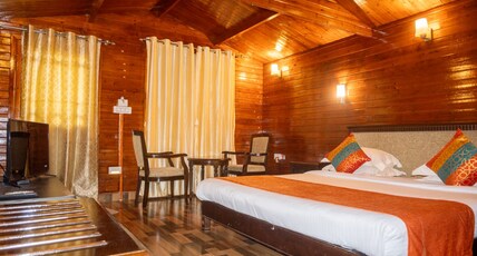 River Roost Resorts Room Type - Deluxe Wooden Cottages with Sitout