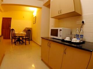 Maple Suites Serviced Apartments - Tap to explore photos