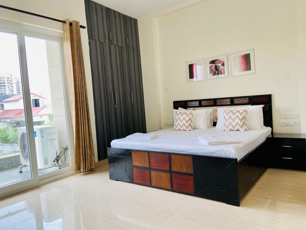 Entire 4BHK Apartment by Bluo at Cyber City - Tap to explore photos