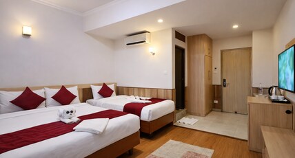 Drishya Hotel Room Type - Deluxe Family Room with Mountain or City View - Free VIP 360 degree Restro lounge access & 10% off Drishya Hotel Room Type - Deluxe Family Room with Mountain or City View - Free VIP 360 degree Restro lounge access & 10% off