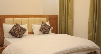 Hotel Golden Aura Room Type - Deluxe room