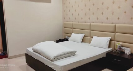HOTEL THE GRAND SARASWATI PALACE Room Type - 2 Bed AC Family Room