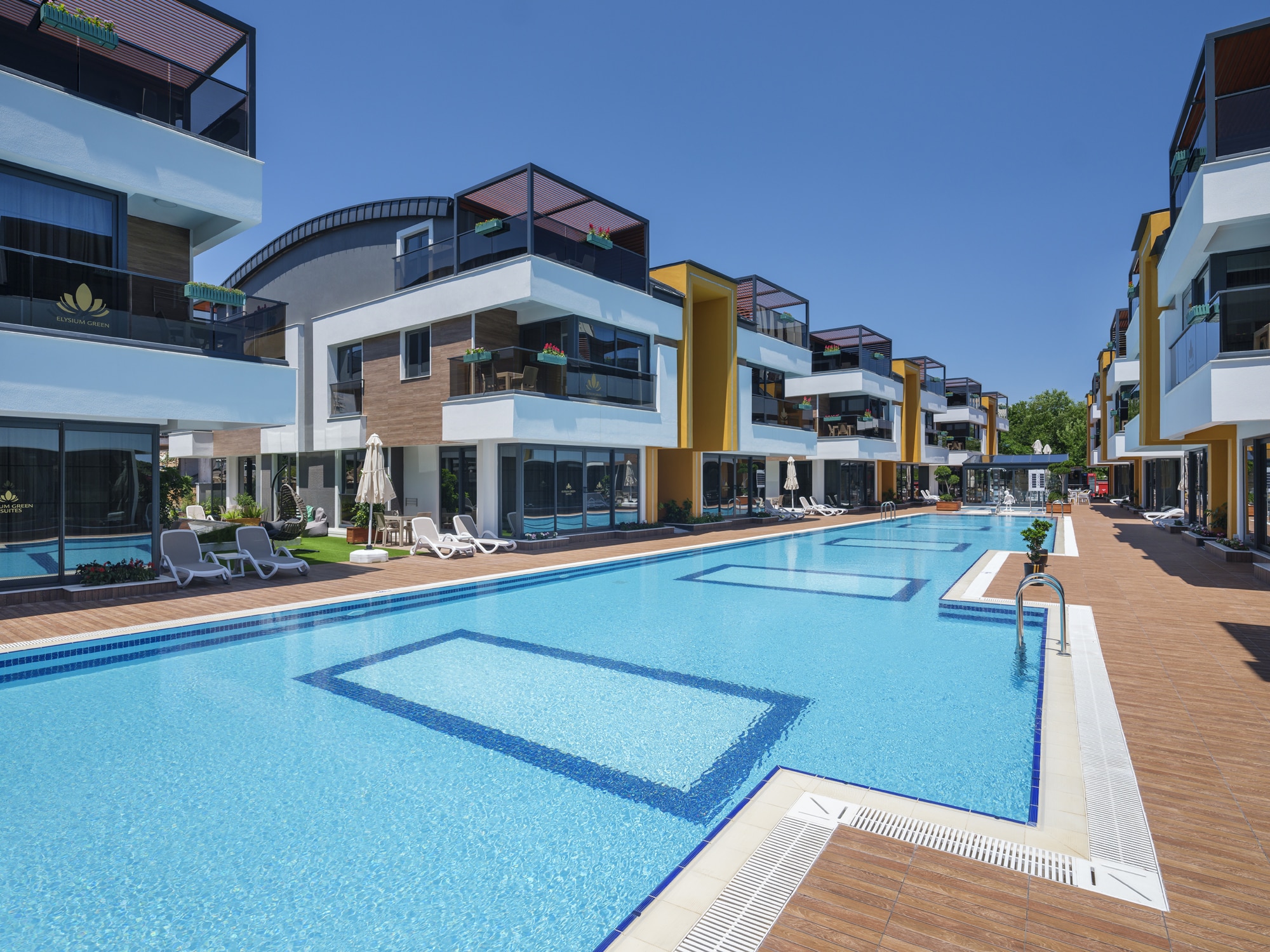 Elysium Green Suites Hotel - Tap to explore photos