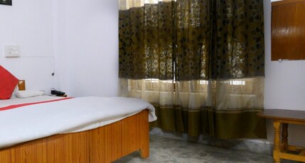 PEACOCK HILL HOMESTAY Room Type - STANDARD ROOM WITH HILL VIEW