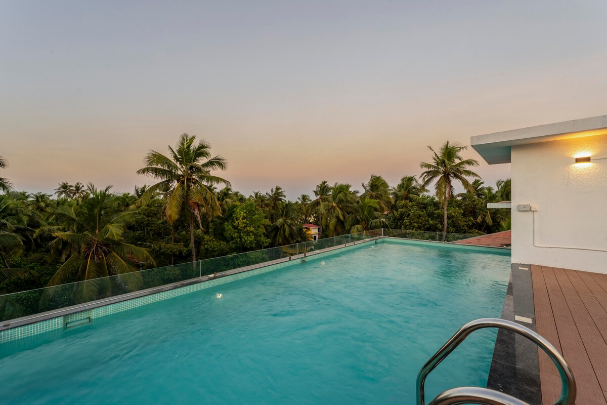 Staymaster Modern 1BHK | Calangute | Shared Pool - Tap to explore photos