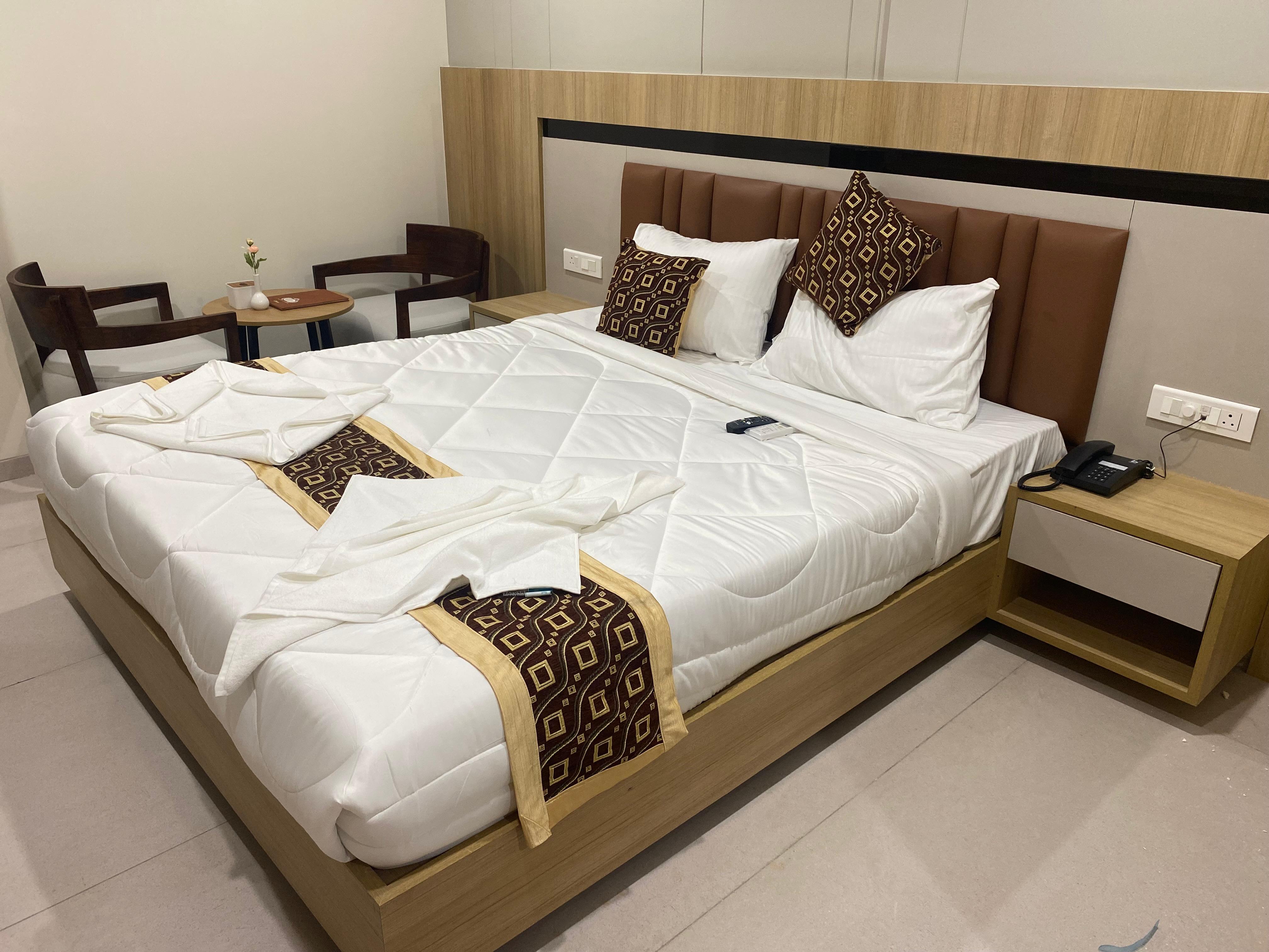 Sangam Hotel by Sameeksha Hospitality - Tap to explore photos