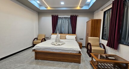 Hotel Pooja Inn Room Type - Deluxe AC Room