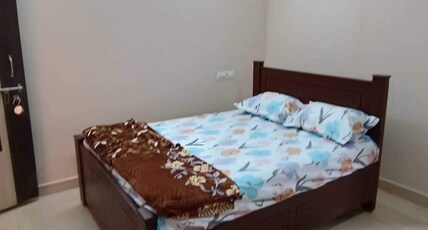 Hotel O Adithya Grand & Homes Room Type - Classic