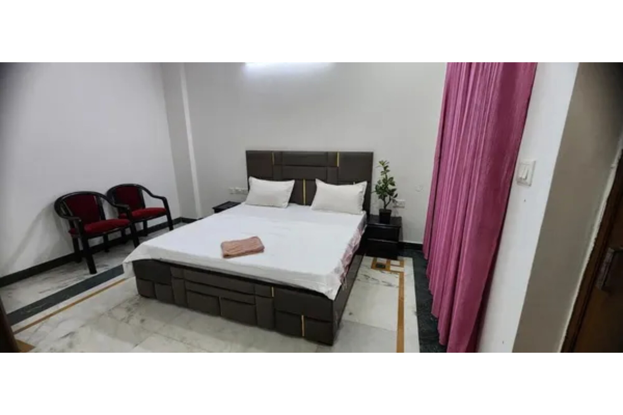 FabHotel Maurya Residency - Tap to explore photos