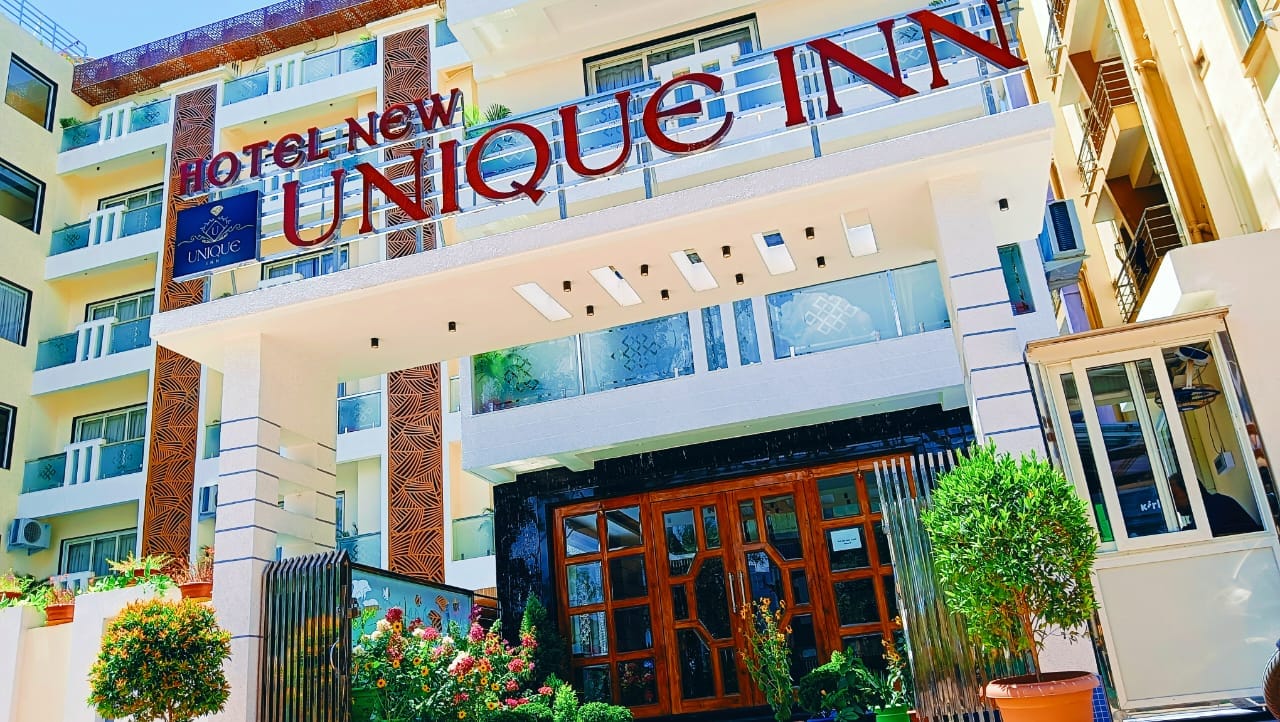 NEW UNIQUE INN - Tap to explore photos