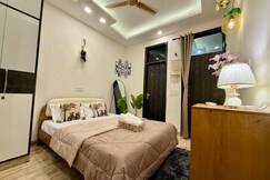 Rooms of The Comfort Cove 1BHK Near IGI Airport Yashobhoomi