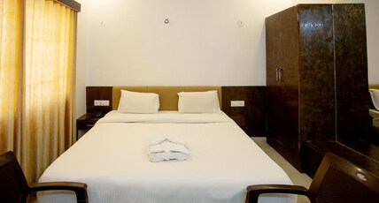Hotel The Paradise Room Type - Deluxe AC Room with Private Sit out.