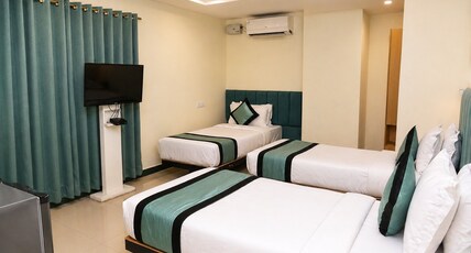 Hotel Konark Inn Room Type - Triple Twin Bed Room
