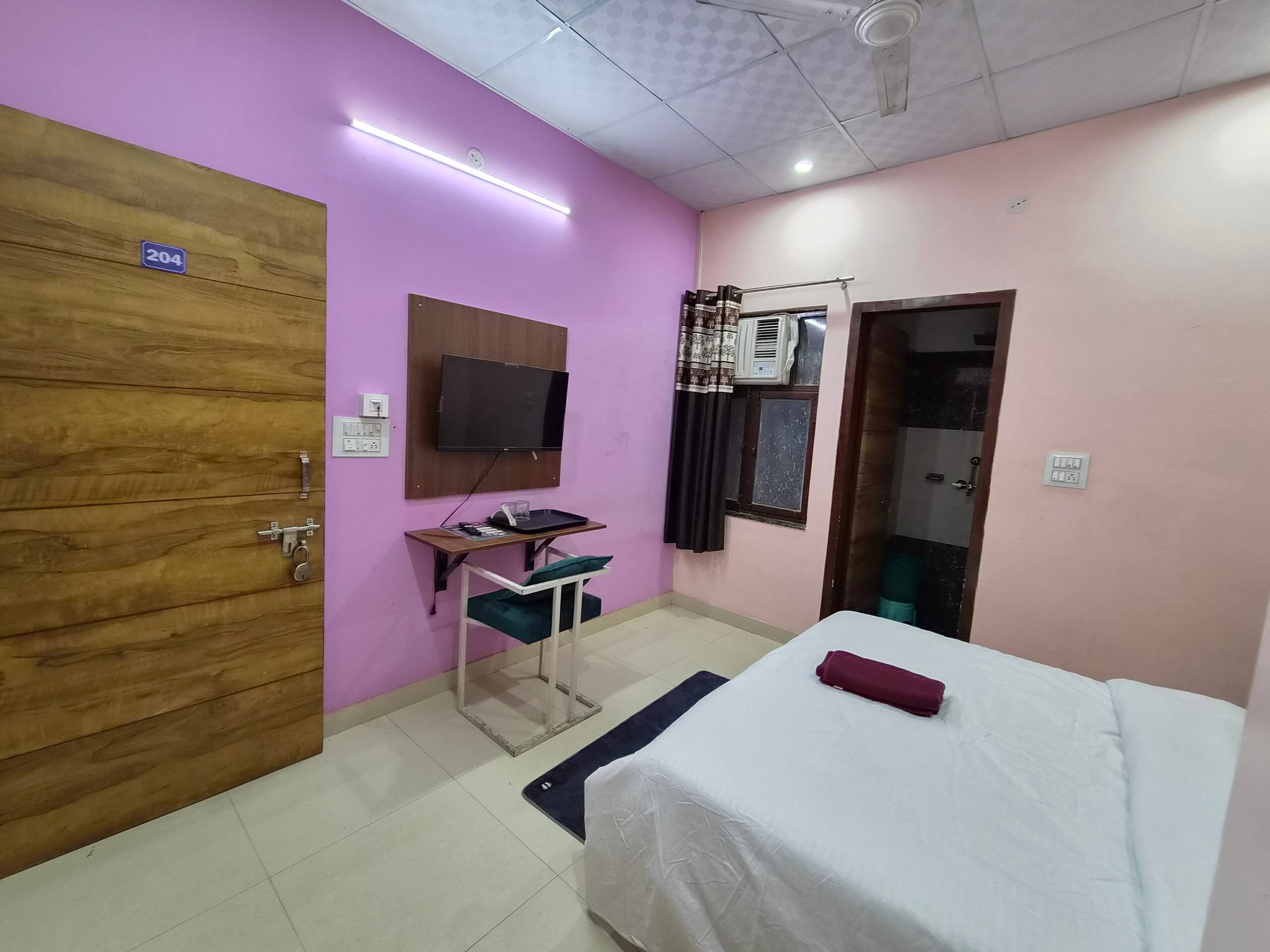 Delight 204 Stay budget rooms airport Budget - Tap to explore photos