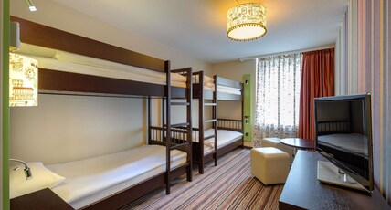 Movenpick Hotel Egerkingen Room Type - FAMILY ROOM WITH 2 QUEEN-SIZE BEDS Movenpick Hotel Egerkingen Room Type - FAMILY ROOM WITH 2 QUEEN-SIZE BEDS
