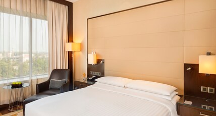 Kochi Marriott Hotel Room Type - Pool View Twin with Seating Area Kochi Marriott Hotel Room Type - Pool View Twin with Seating Area