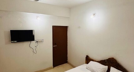 Ganesh Homestay Room Type - DELUX ROOM