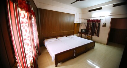 Royal Residency Erumeli Room Type - Trippe Bed Room Non AC