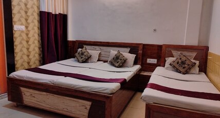 SHRADDHA HOTEL Room Type - Standard Triple Bed Room With Ac