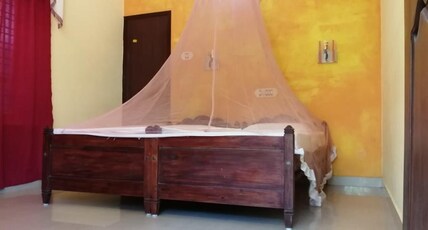 Red Palm Homestay Room Type - Deluxe AC
