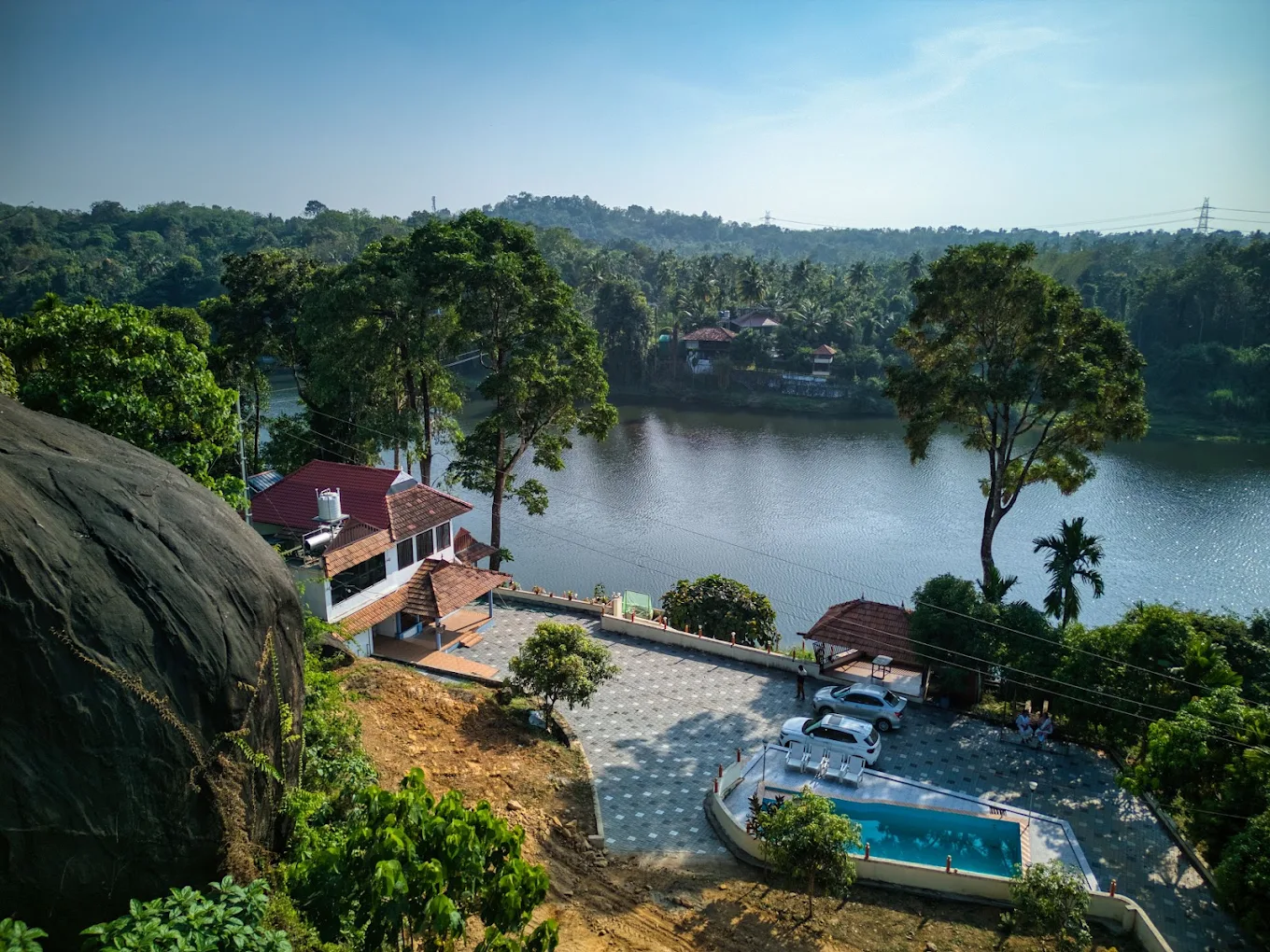 River Rock Resort near Athirapilly Waterfalls - Tap to explore photos