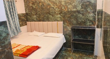 HITHIKA RESIDENCY Room Type - Bedroom 1