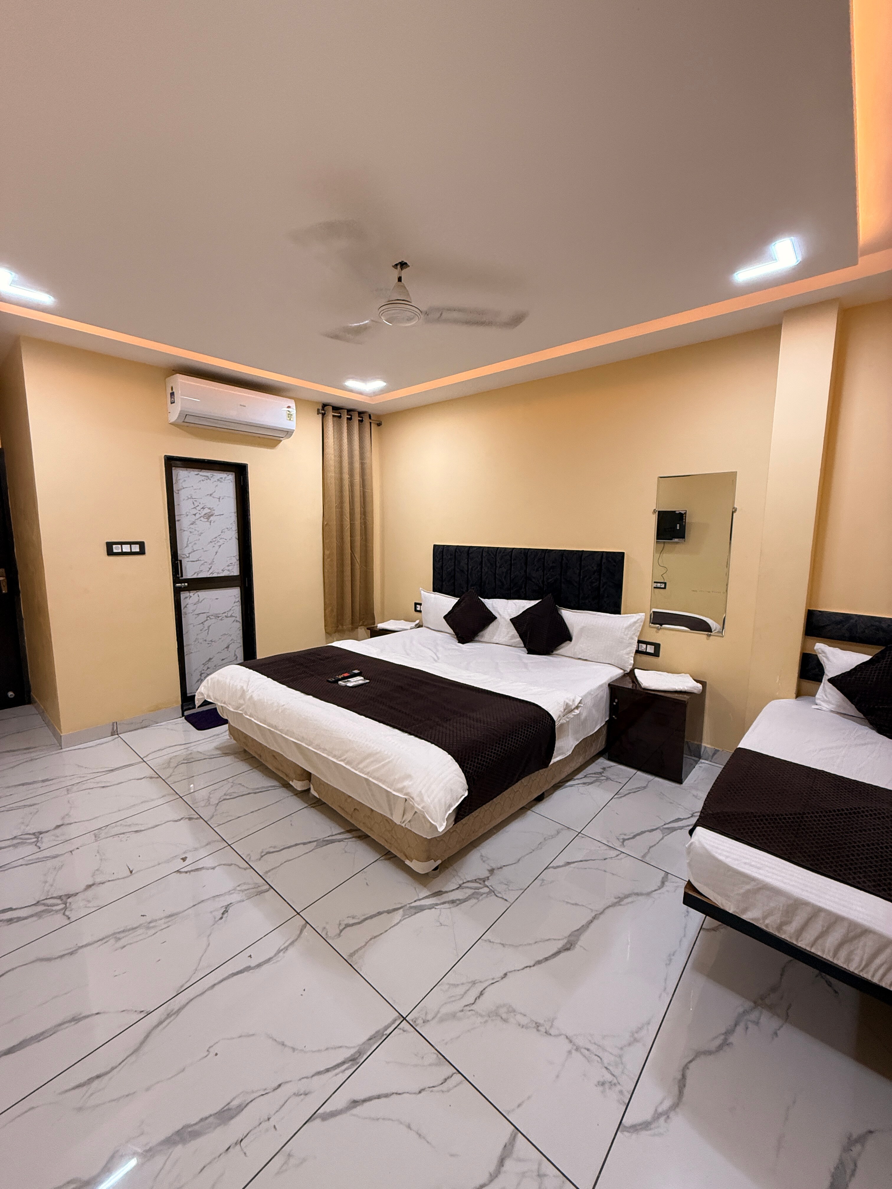Hotel Roshan - Tap to explore photos