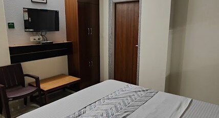 Vairaj Banquet Hall & Rooms Room Type - Deluxe Room